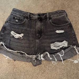 I am selling these washed black jean shorts.